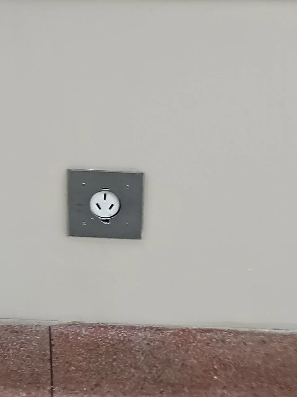 A psychiatry-service floor at Caracas’s University Hospital illustrates the specialist-care context discussed here without implying universal access.