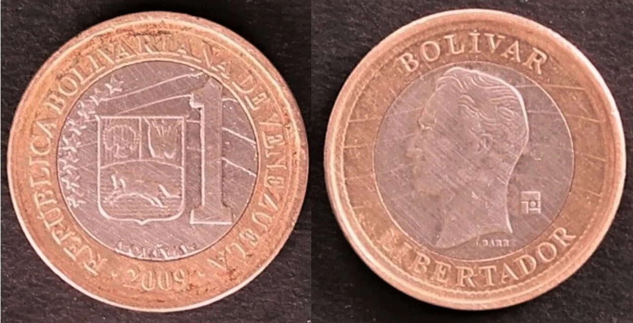 A 2009 1 Bolívar Fuerte banknote provides historical visual context for Venezuela’s monetary instability.