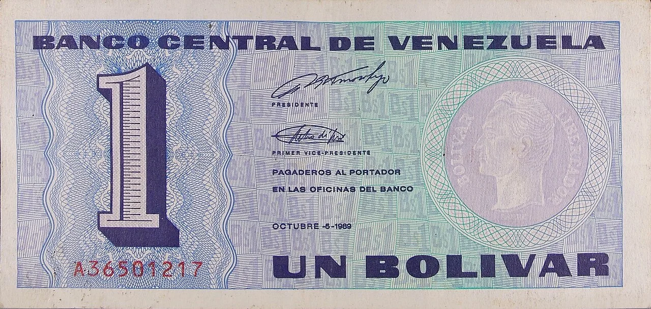 A Venezuelan one-bolívar note from the 1989 monetary cone represents the bolívar as a formal unit of account.