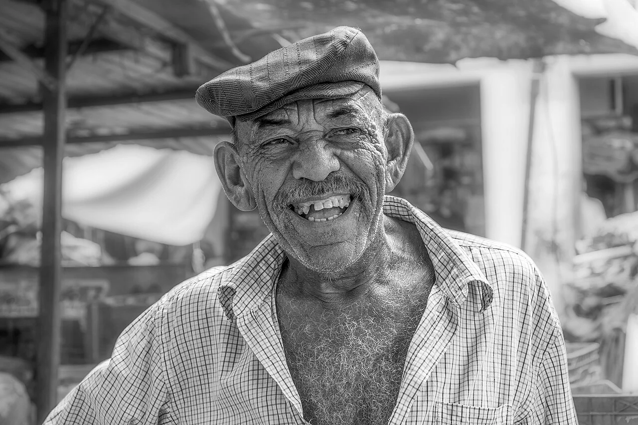 A fishmonger at a street market in Maracaibo, Venezuela.