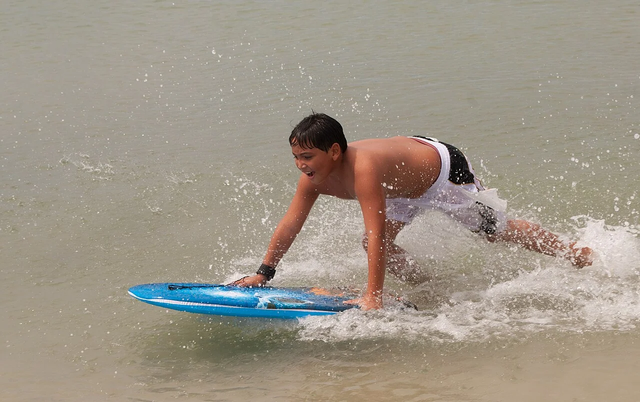 Children playing at El Guamache Bay on Margarita Island, Venezuela.