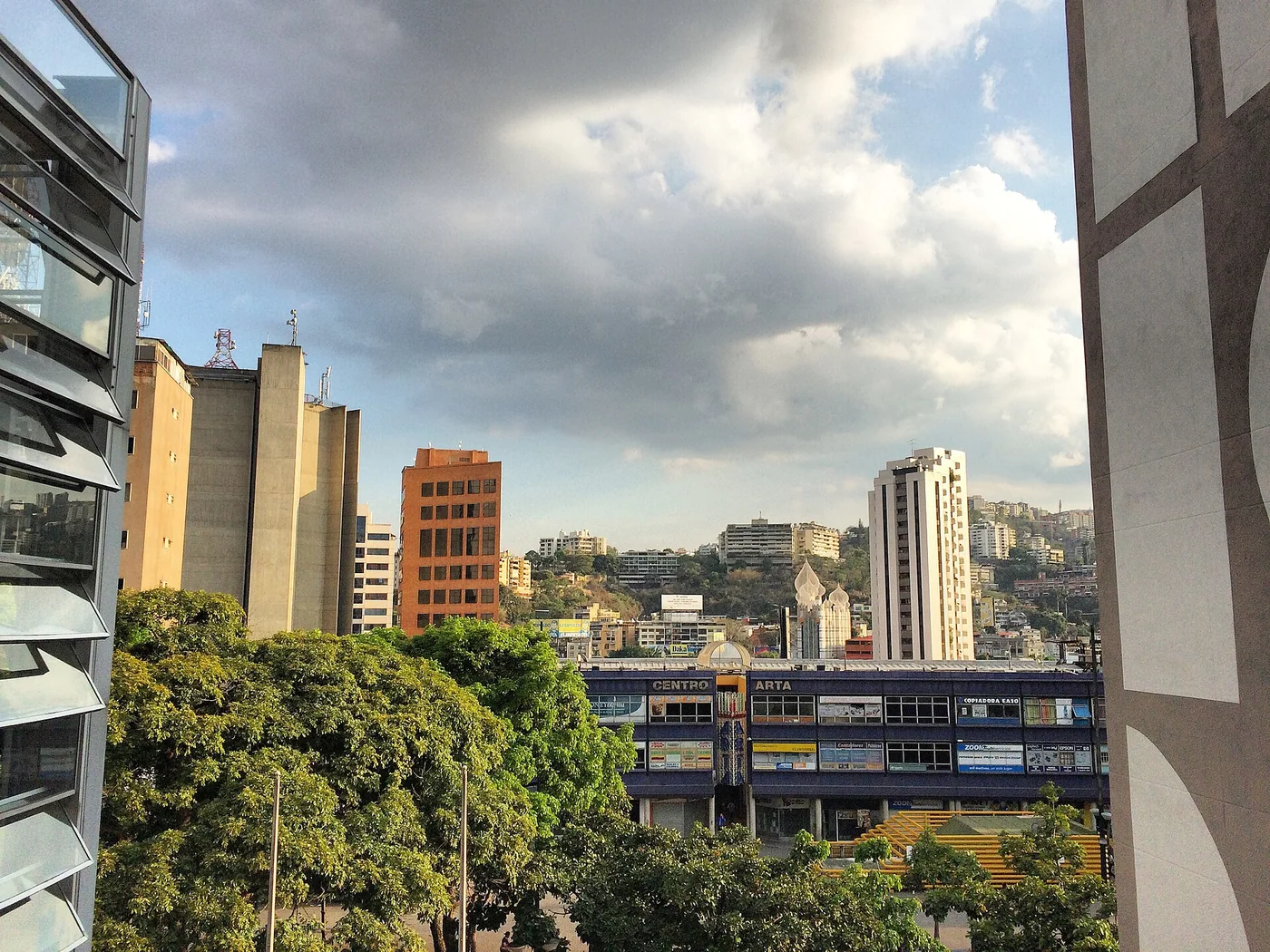 El Rosal, Caracas, with office and commercial buildings and hillside housing visible beyond.