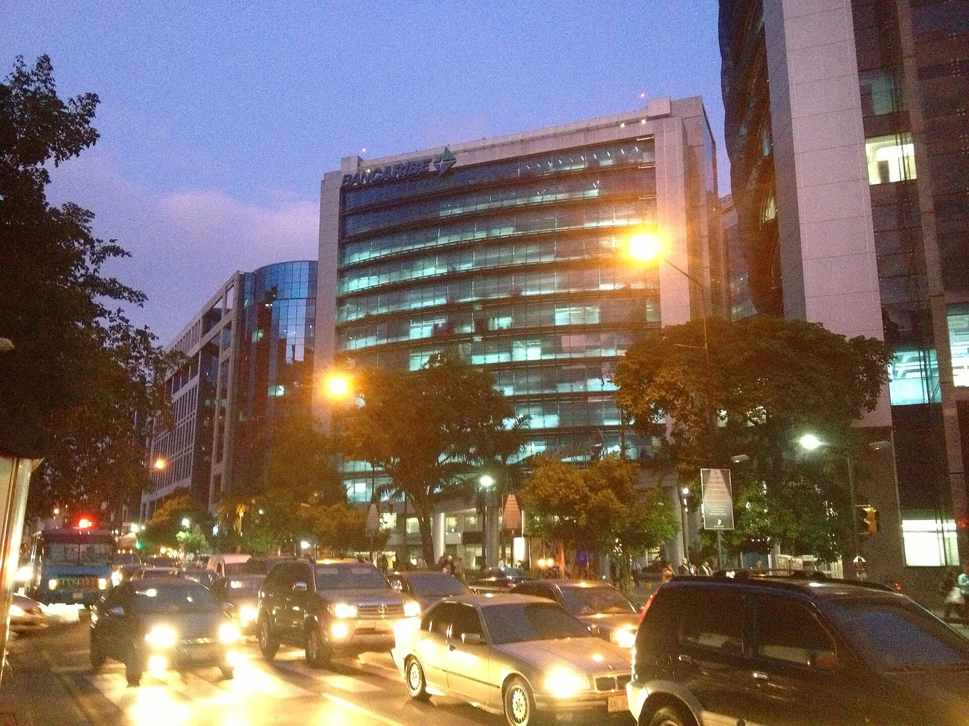 Centro Empresarial Galipan office building in El Rosal, Caracas, at dusk.