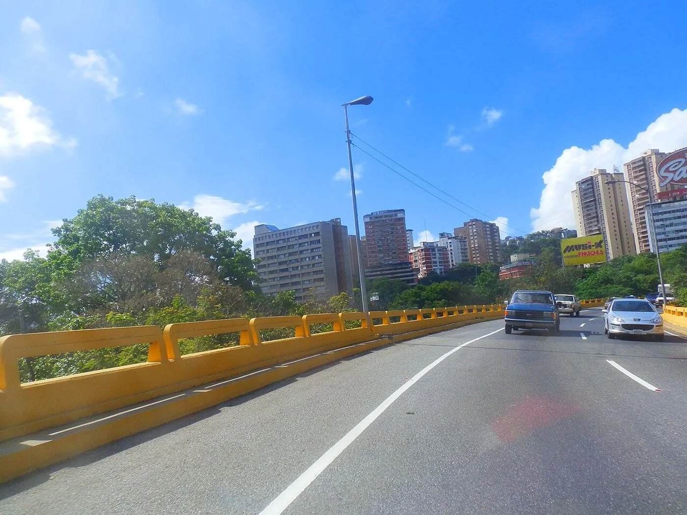 Road approach toward Ciudad Universitaria in Caracas, Venezuela.