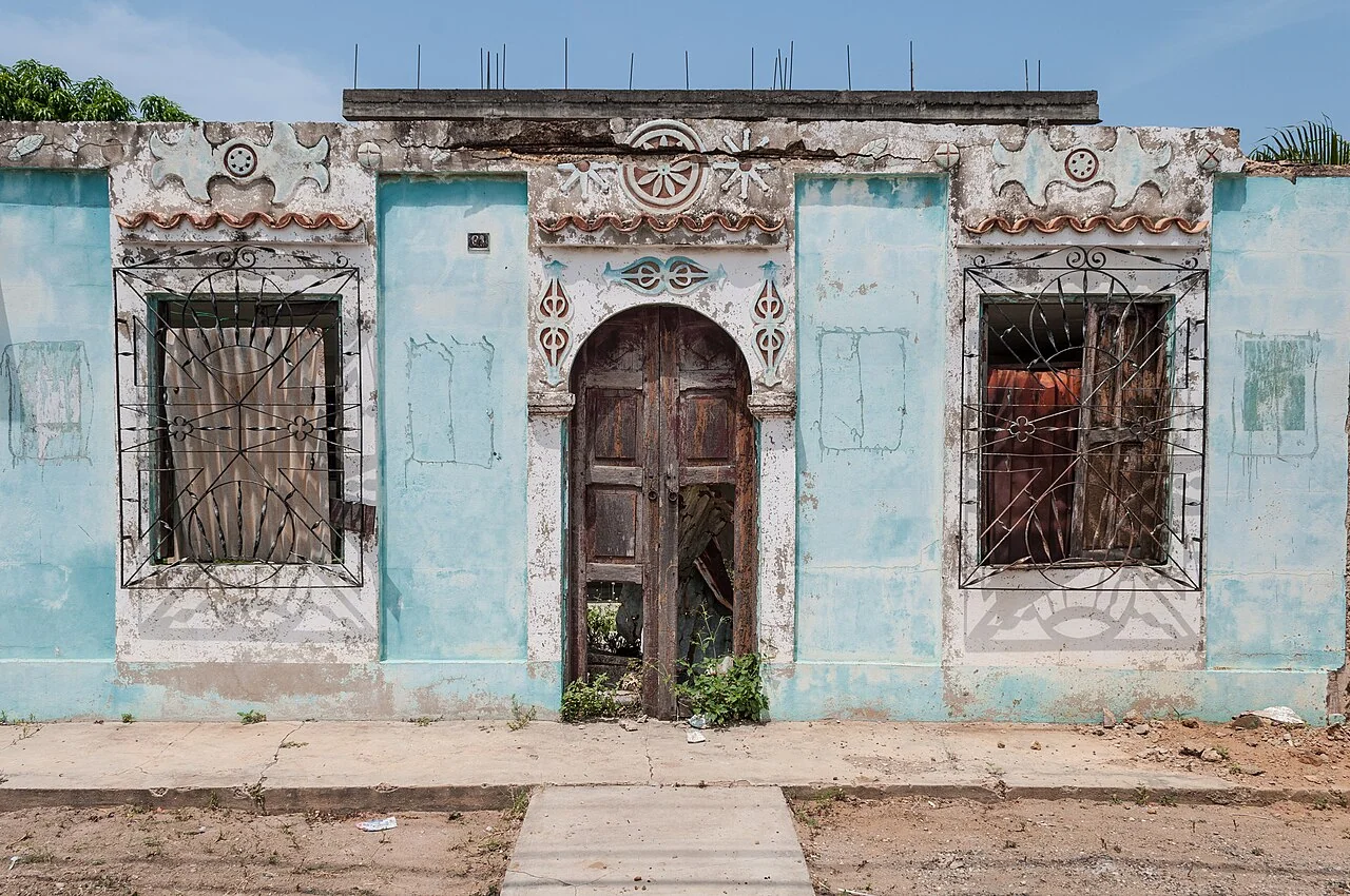Abandoned turquoise house on the Costa Oriental del Lago, Zulia.