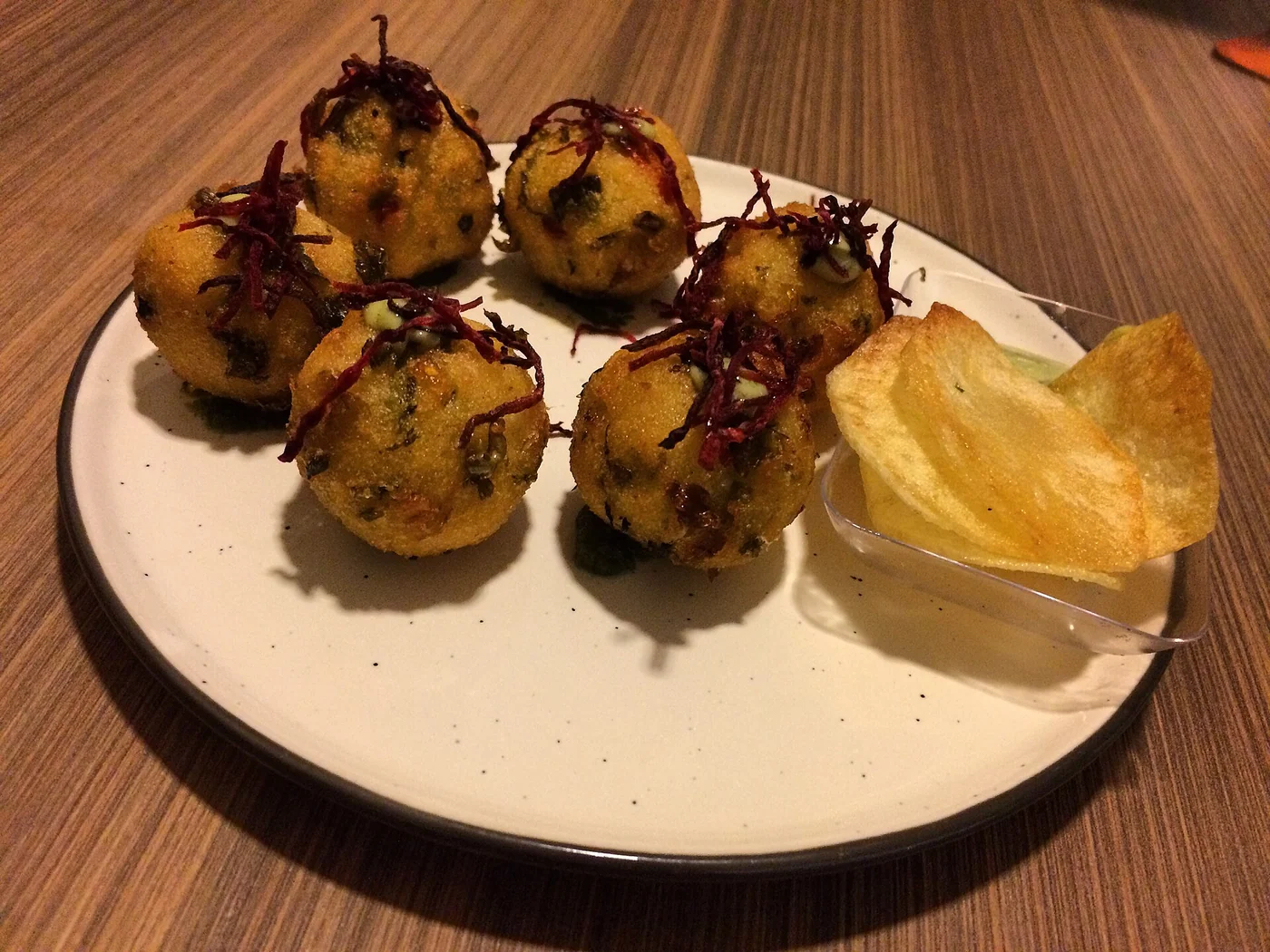 Restaurant dining room and plated food at Eight Bistro in Caracas