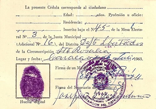Reverse of a 1963 Venezuelan electoral-registration cédula, showing how an identity record can carry official text and validation marks.