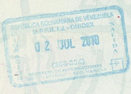 Venezuelan passport entry stamp, shown in the children-and-cross-border section as a travel-record example rather than a child-consent rule.
