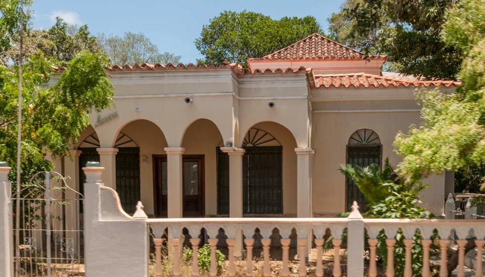 Cream-colored house with an arched veranda in Juan Griego, Margarita Island.