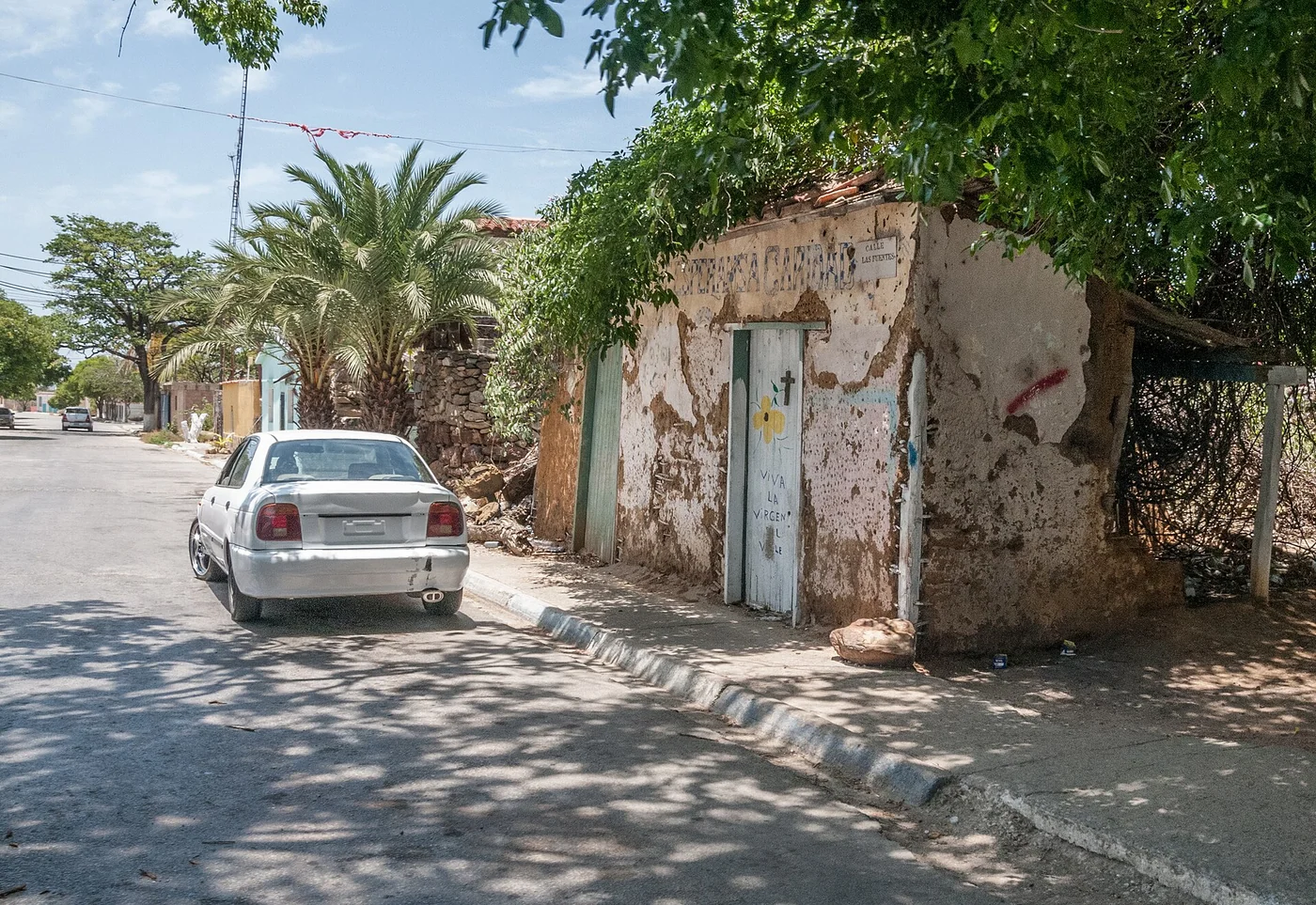 Weathered colonial house beside a road on Margarita Island, Venezuela.